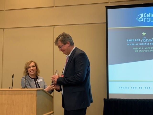 ISSCD President Professor Knut Lundin receiving the prestigious prize certificate.