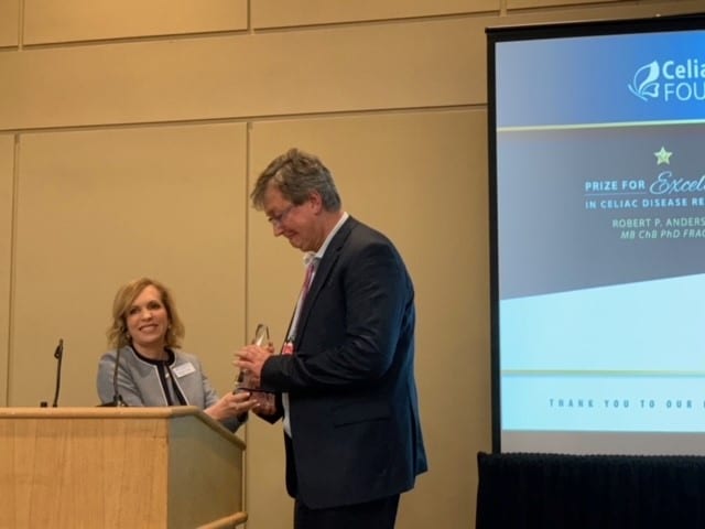 ISSCD President Professor Knut Lundin receiving the prestigious prize certificate.